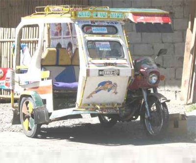 An Aklan tricycle in Kalibo. An Aklan tricycle in Kalibo.